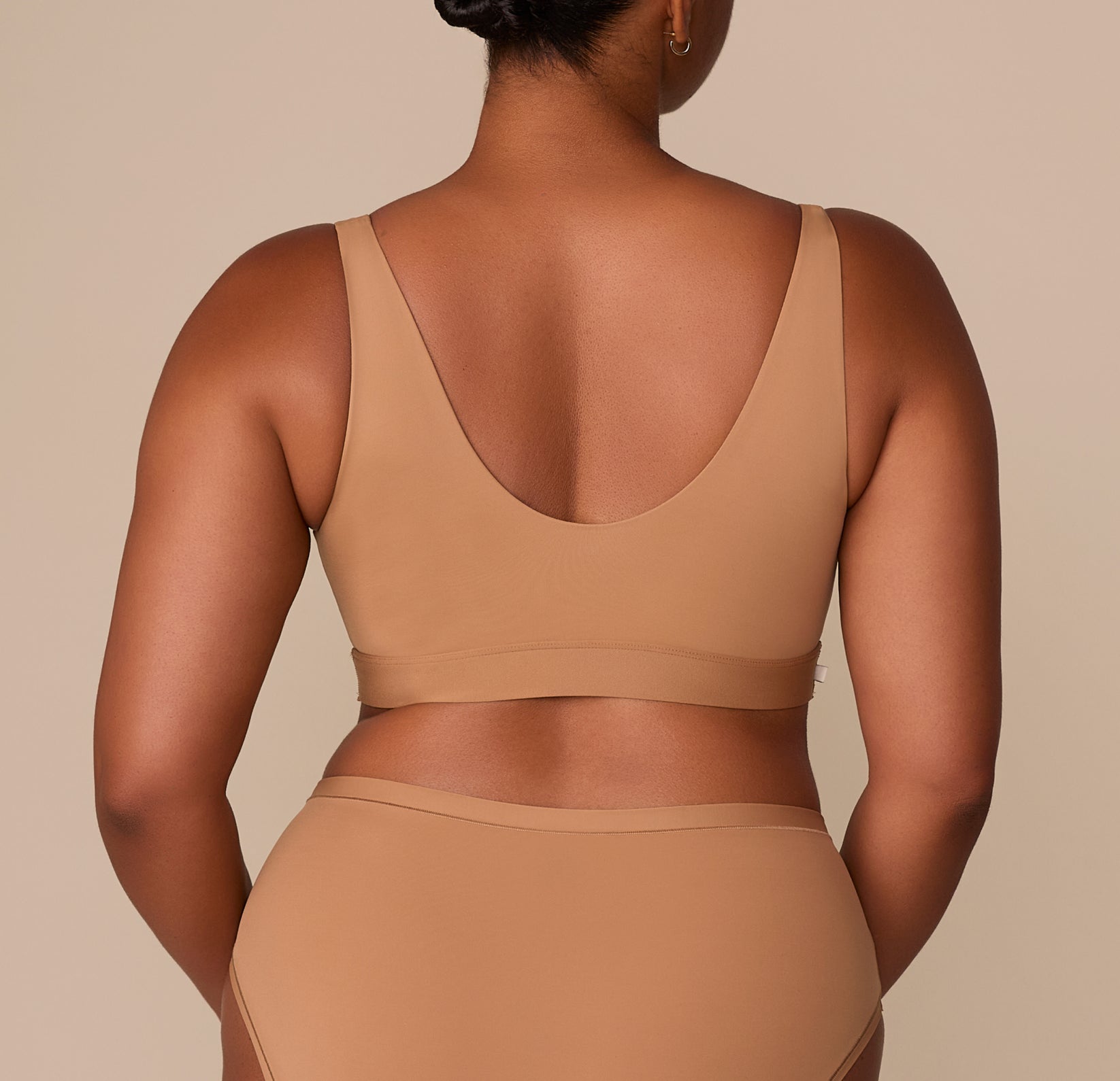 Rear view of the bralette on Zarria, showcasing the deep scoop back and smooth, tag-free finish.