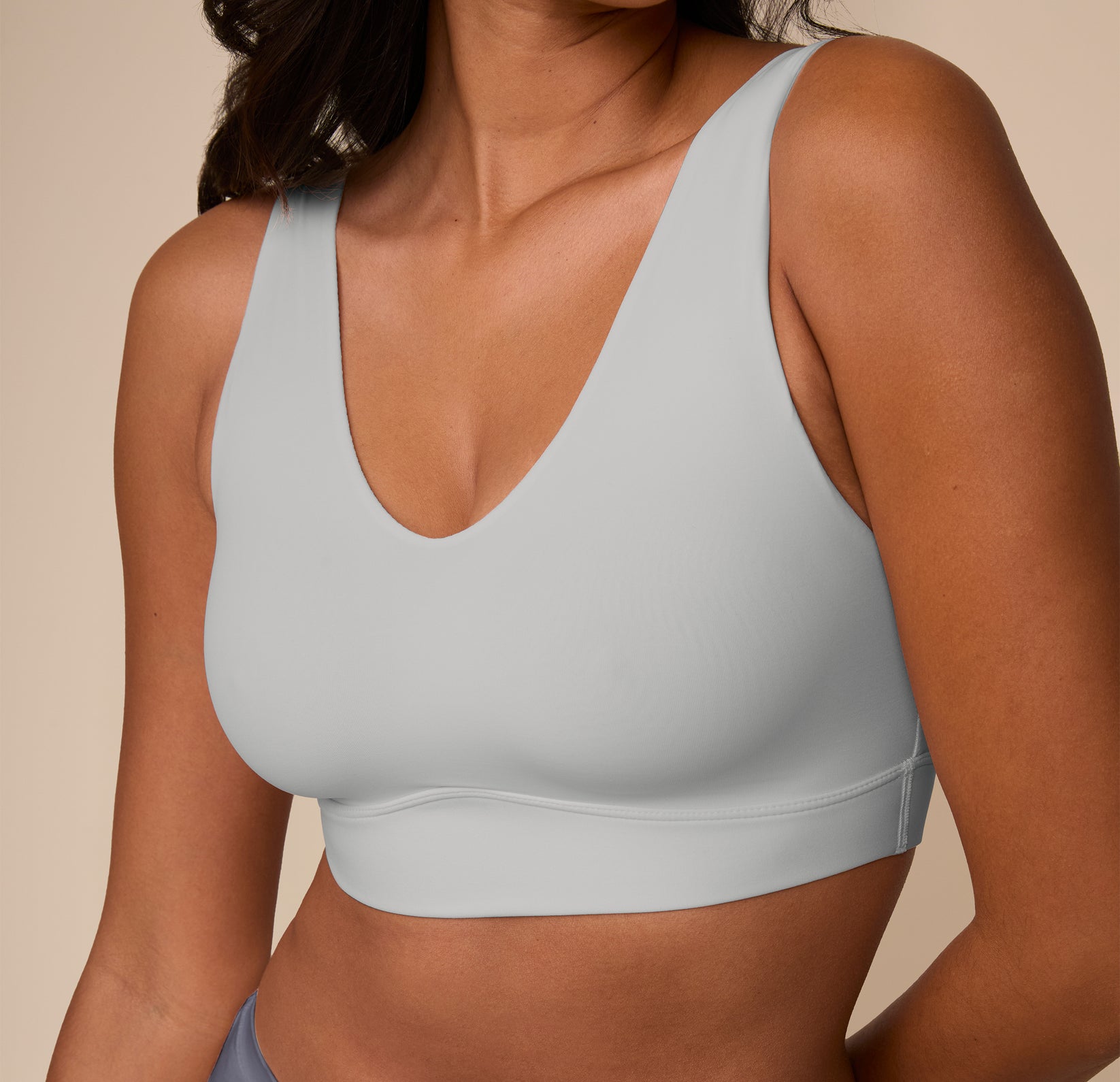 Close-up three quarter view of the Bliss Bralette in Stormy on Victoria, showing the supportive underband and clean neckline designed for all-day ease.
