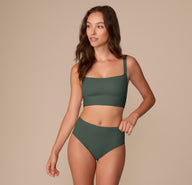 Alexis modeling the Bliss Highwaist Brief in Fir, styled with the matching Bliss Square Neck Bralette for a coordinated set.