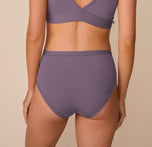 Back view of Freya in the Bliss Highwaist Brief in Eclipse and Bliss Triangle Bralette in Eclipse. The brief features a minimal seam finish and full rear coverage, complementing the deep V-back of the bralette.