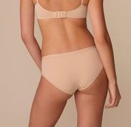 Rear view of the Bliss Hiphugger on Alexis, highlighting full back coverage and seamless finish.