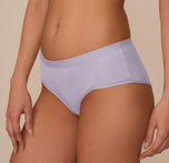 Angled close-up of the Bliss Hiphugger in Violet, showcasing the soft-touch fabric and minimal seam finish across the hip and leg openings for an ultra-smooth fit.