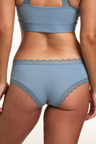 Close-up back view of the Bliss Lace Cheeky in Poolside, highlighting the soft lace trim along the waistband and leg openings with smooth microfiber fabric.