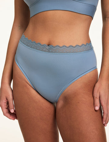 Close-up of the Bliss Lace Highwaist in Poolside paired with a matching Poolside bralette, highlighting the high-rise fit, smooth microfiber fabric, and soft lace trim. sizing: Sonnie wears size Large