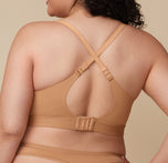 Back view of Bianca in the Bliss Plunge Adjustable Bralette showing the racerback strap configuration.