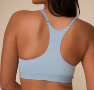 Detailed rear view of the Bliss Racerback Bralette in Glacier, emphasizing the clean stitching and comfort-forward racerback design.