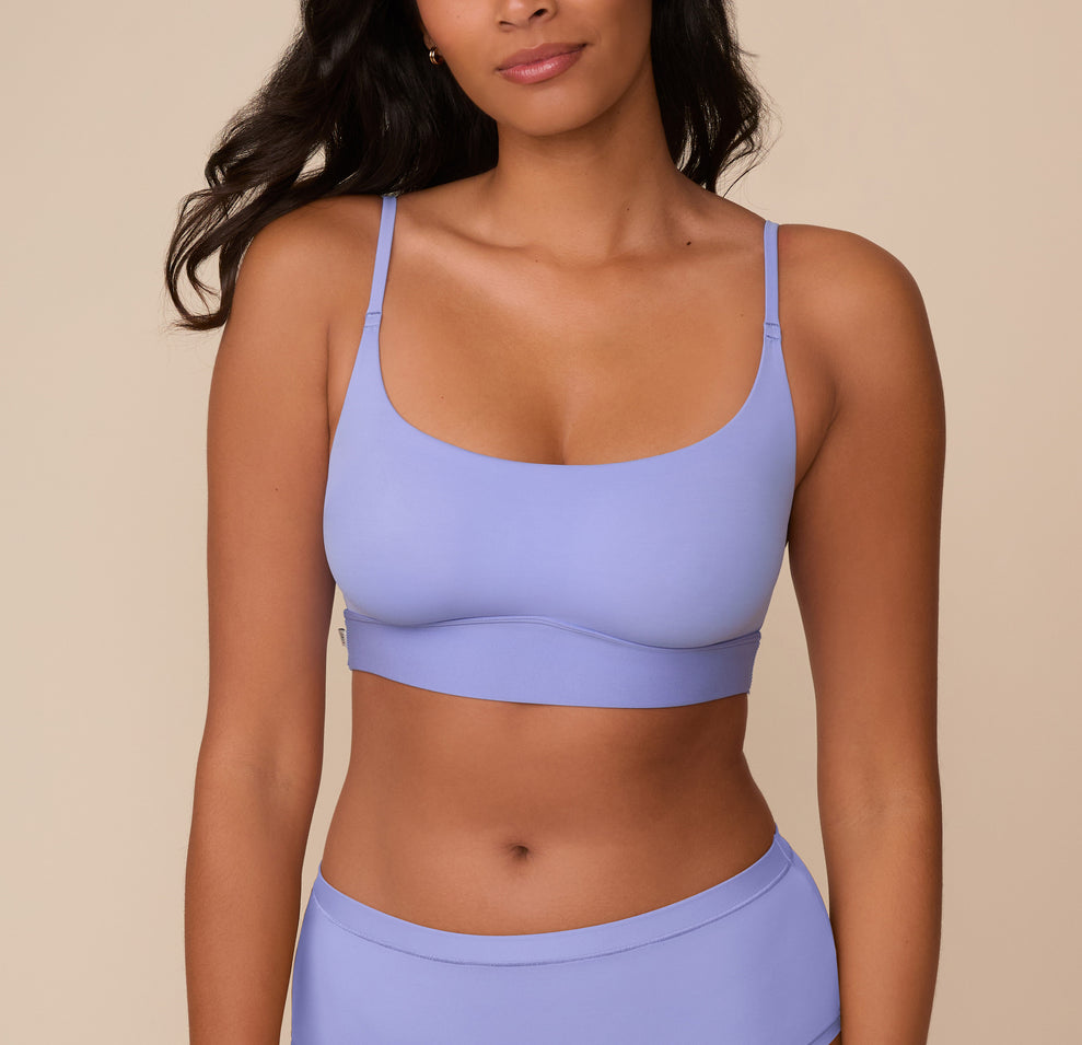 Close-up of Victoria wearing the Bliss Scoop Bralette in Dusk. The image highlights the bralette's scoop neckline, adjustable straps, and smooth fit. sizing: Victoria wears size Medium