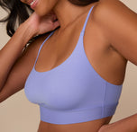 Side angle of Victoria wearing the Bliss Scoop Bralette in Dusk, showing the flattering scoop shape and how it lays smoothly against the body.