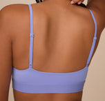 Close-up of the bralette’s back, highlighting the adjustable straps, wide underband, and clean finish of the Bliss Scoop Bralette in Dusk.