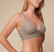 Close-up of Megan in the Bliss Triangle Bralette in Desert. The soft, microfiber material and deep v neck design ensure comfortable and secure fit.