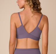 Back view of Freya in the Bliss Triangle Bralette in Eclipse and Bliss Highwaist Brief in Eclipse. The image highlights the bralette’s smooth V-back shape and wide band, along with the seamless rear coverage of the brief.