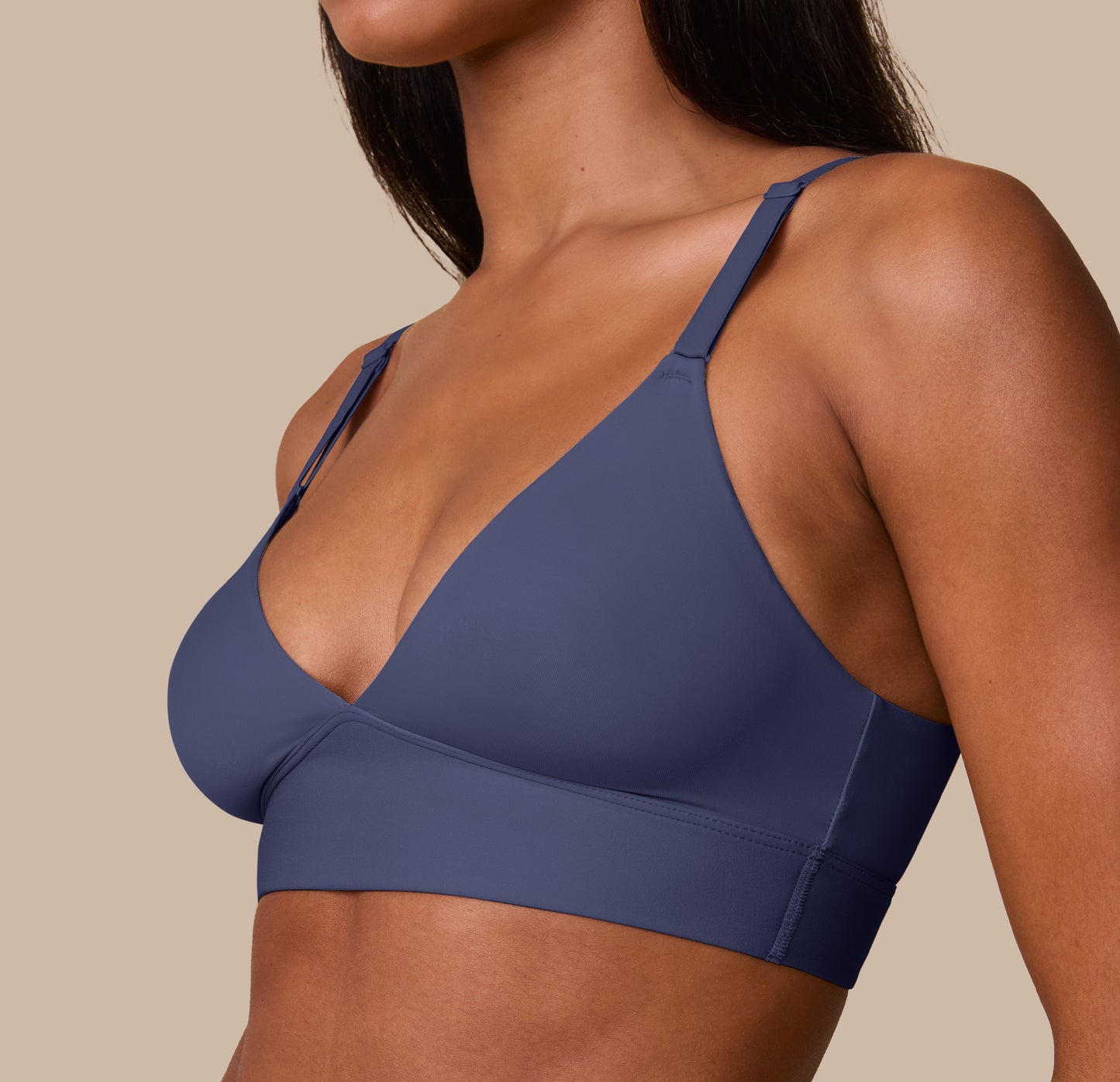 Close-up side angle of Ally in the Bliss Triangle Bralette in Twilight, showing the smooth fabric and subtle shaping under the arms.