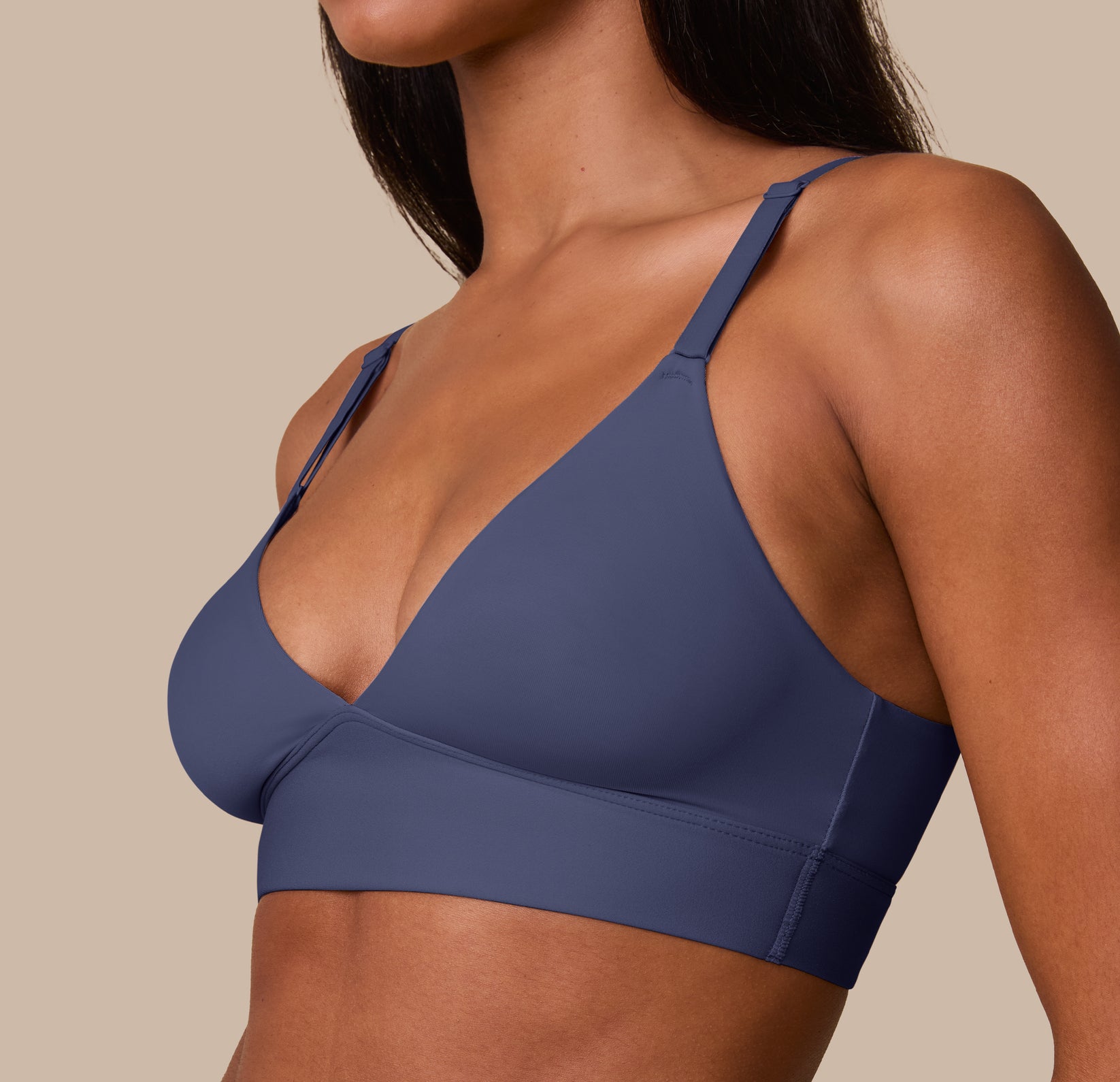 Close-up side angle of Ally in the Bliss Triangle Bralette in Twilight, showing the smooth fabric and subtle shaping under the arms.