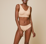 Woman wearing the bliss hiphugger in color beige