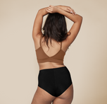 Woman wearing the Bliss Triangle Bralette in the color Brown