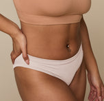 Close-up of the Cloud Cotton Bikini in Quartz on Jade, highlighting the smooth seams, breathable cotton fabric, and soft stretch waistband.