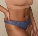 Close-up of the Cloud Cotton Bikini in Slate on Jade, highlighting the smooth seams, breathable cotton fabric, and soft stretch waistband.