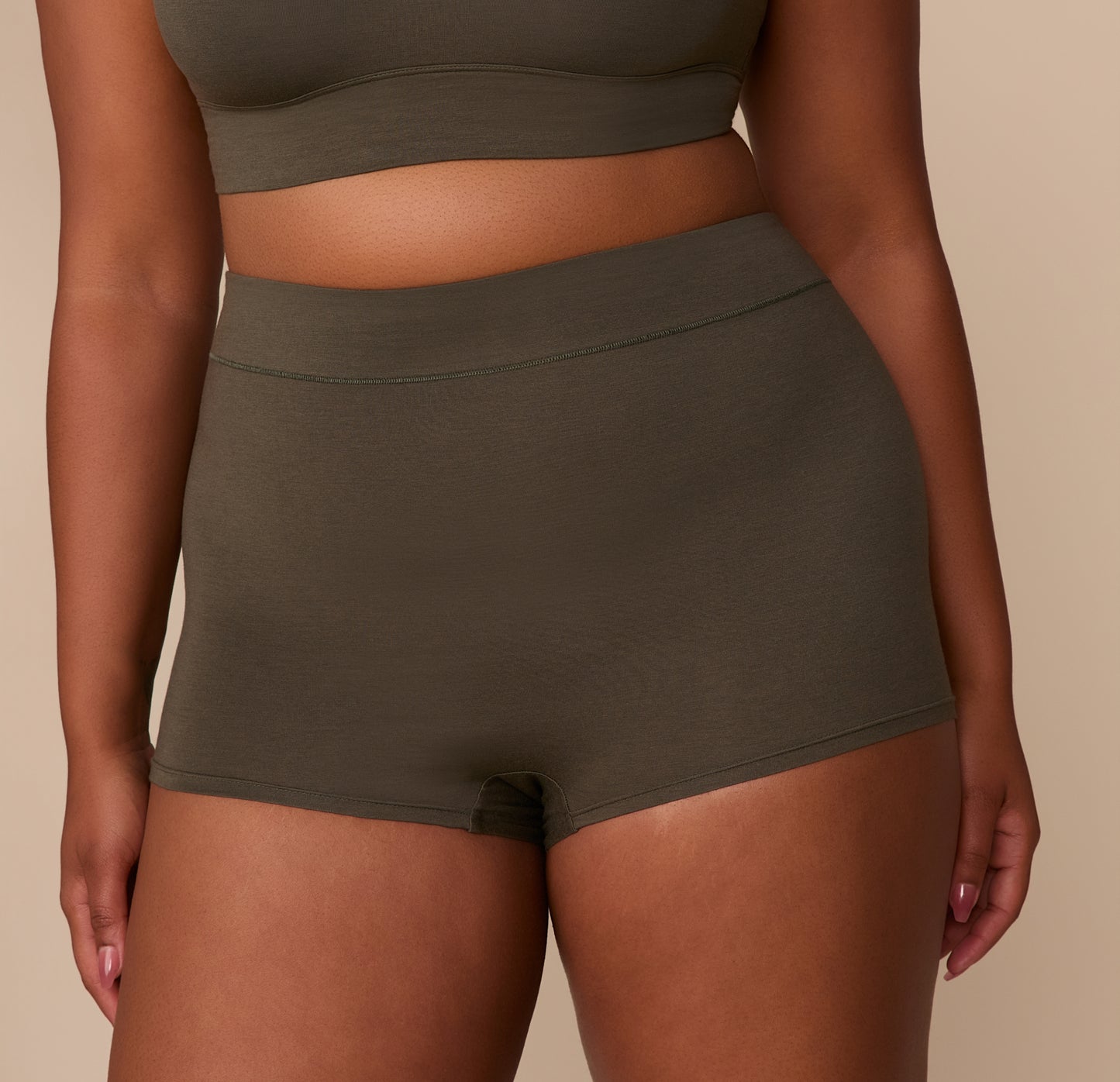 Close-up of Zarria in the Cloud Cotton Highwaist Boyshort in Olive, focusing on the high waistband and smooth cotton-modal fabric.