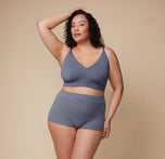 Full-body view of Bianca standing confidently in the Cloud Cotton Triangle Bralette and Highwaist Boyshort in Slate. 