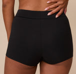 Close-up back view of the Cloud Cotton Highwaist Boyshort in Black. The image focuses on the fabric’s gentle contour and the no-dig fit around the thighs.