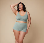 Front face view of Bianca wearing the Cloud Cotton Boyshort in Seaglass paired with the matching Cloud Cotton Triangle Bralette.