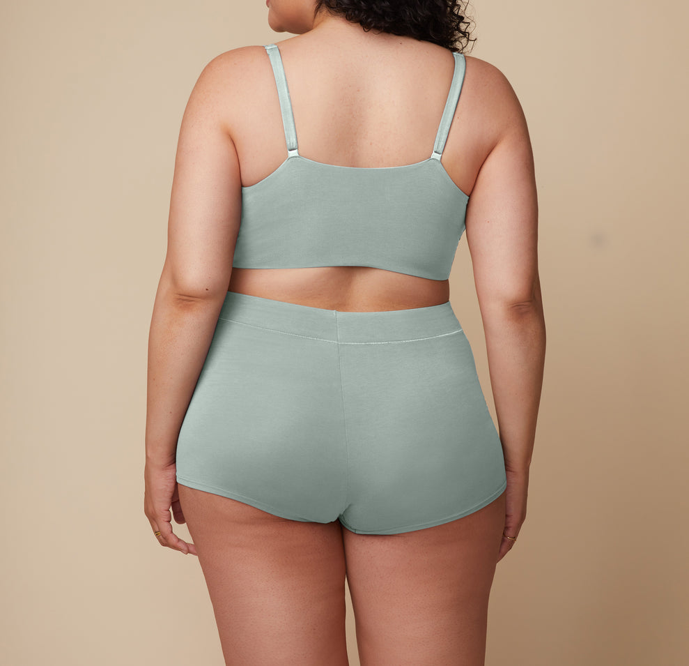 The full back view displays the stretchy fit and the minimal seam design that offers ample coverage with ultimate comfort.