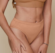 Front close up view of the Cloud Cotton French Cut Brief in Dune. The comfortable seams and high waistband are emphasized.