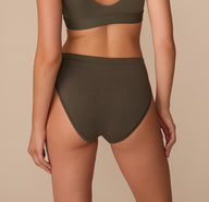 Back view of Alexis in the Cloud Cotton French Cut Brief in Olive, highlighting moderate coverage and smooth seams.