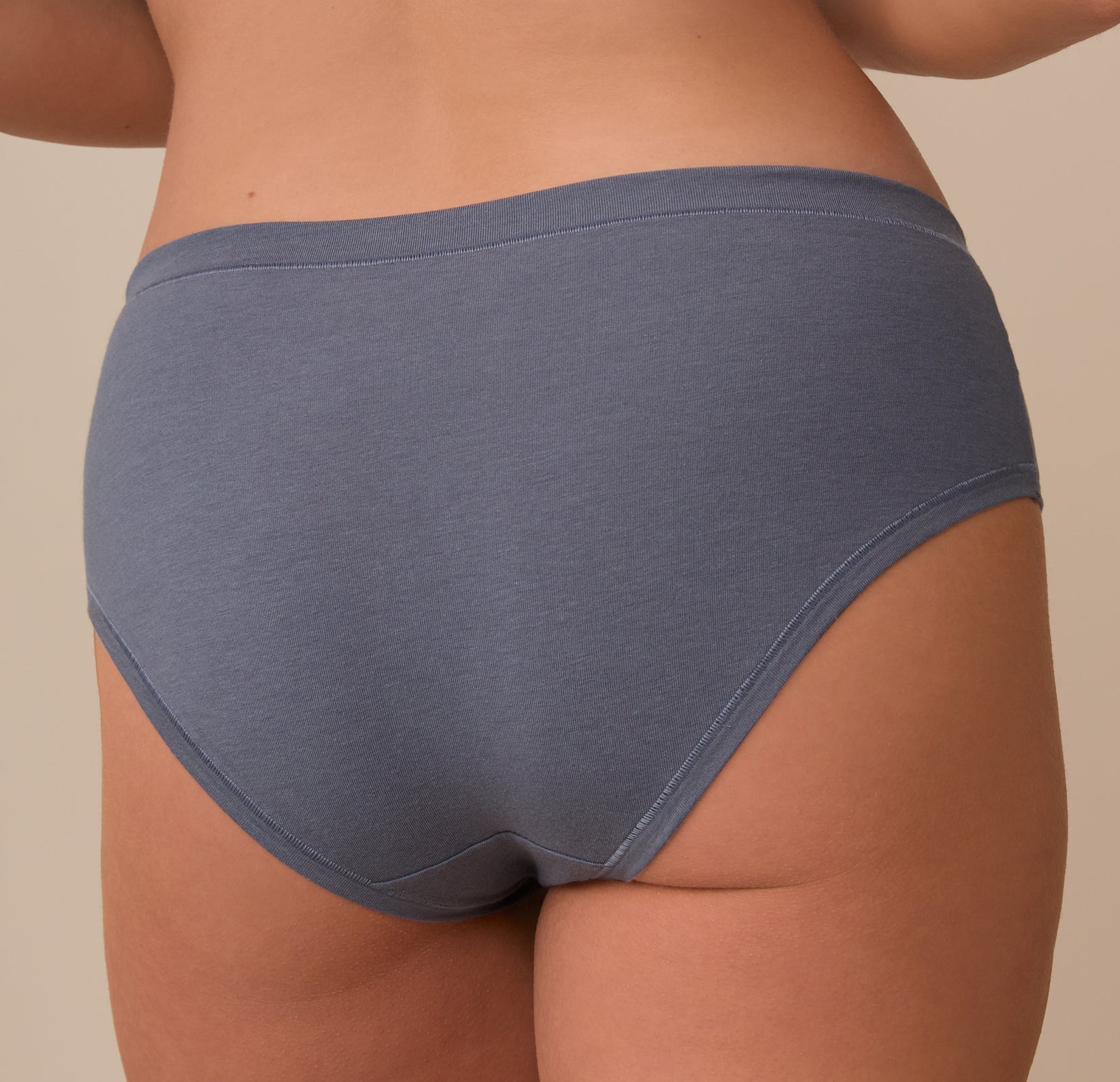 Close-up of the back of the Cloud Cotton Hiphugger in Slate. The image captures the curve-hugging fit and ultra-soft fabric that moves with the body.