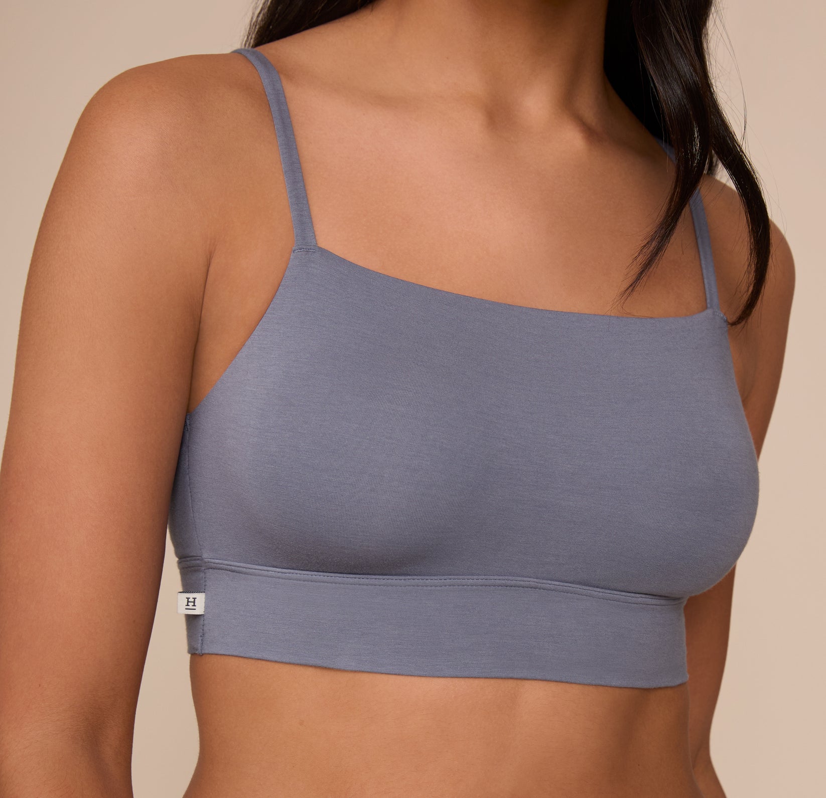 A crisp close-up of the Cloud Cotton Thin Strap Bralette in Slate on Nemesis, drawing attention to the soft cotton fabric and supportive wide underband.