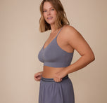 Sonnie wearing the Cloud Cotton Triangle Bralette and Cloud Cotton Pajama Shorts in Slate. The image highlights the soft triangle shape and smooth cotton finish. sizing: Sonnie wears size XL