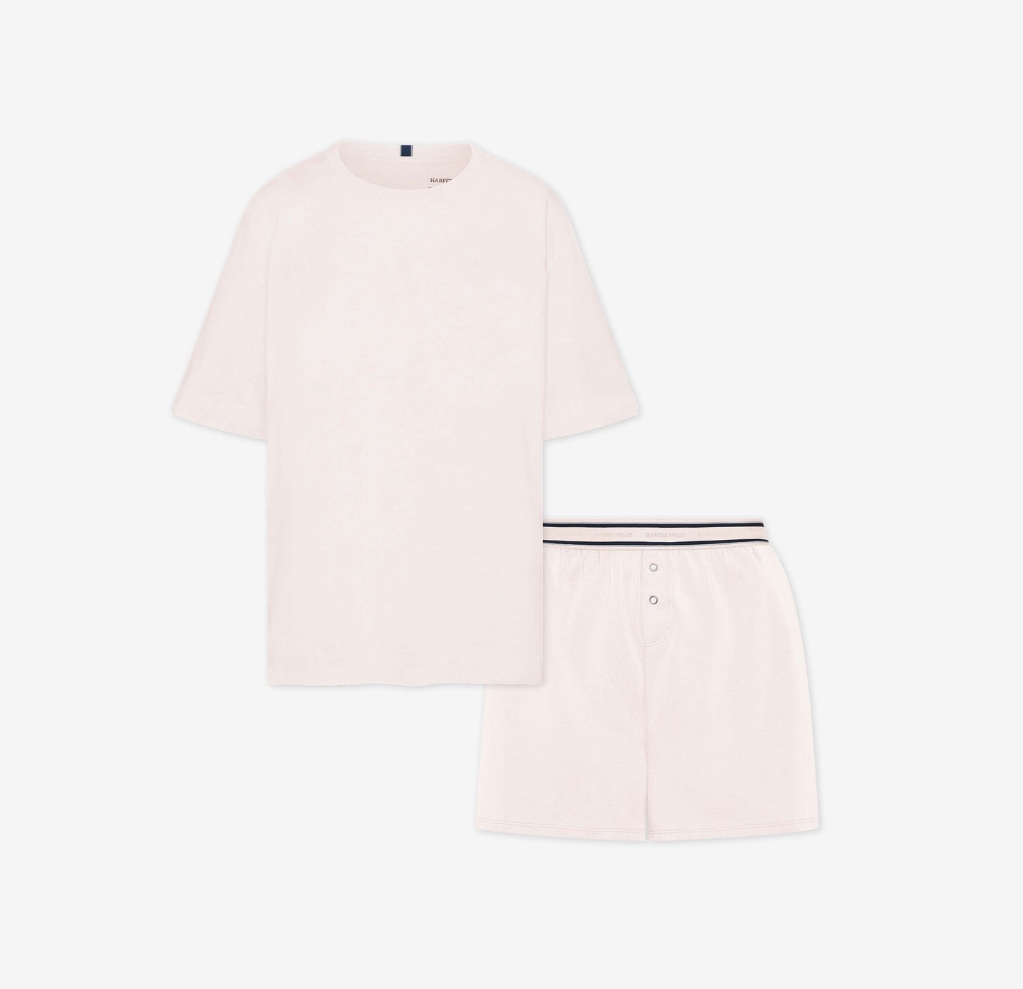 Flat lay of the Cloud Cotton Sleep Set in Quartz, featuring a short-sleeve tee with chest pocket and matching boxer-style sleep shorts. The shorts have a button fly and tonal waistband with a thin black stripe detail. Displayed against a white background for a clean, minimal presentation.