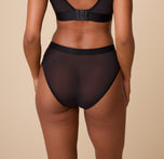 Rear view of the ComfortMesh™ Highwaist Brief in Black. The sheer back fabric hugs the body smoothly, emphasizing the high-rise cut for added coverage and comfort.