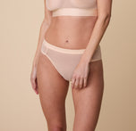 Close up shot of the ComfortMesh Highwaist Brief in Pearl. The sheer fabric is emphasized. sizing: Gracie wears a size Small 