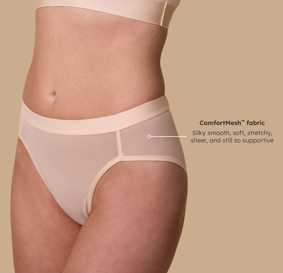 Close-up of the ComfortMesh™ Highwaist Brief in Pearl with the fabric’s tagline, "Silky smooth, soft, stretchy, sheer, and still so supportive," showcasing its lightweight design.