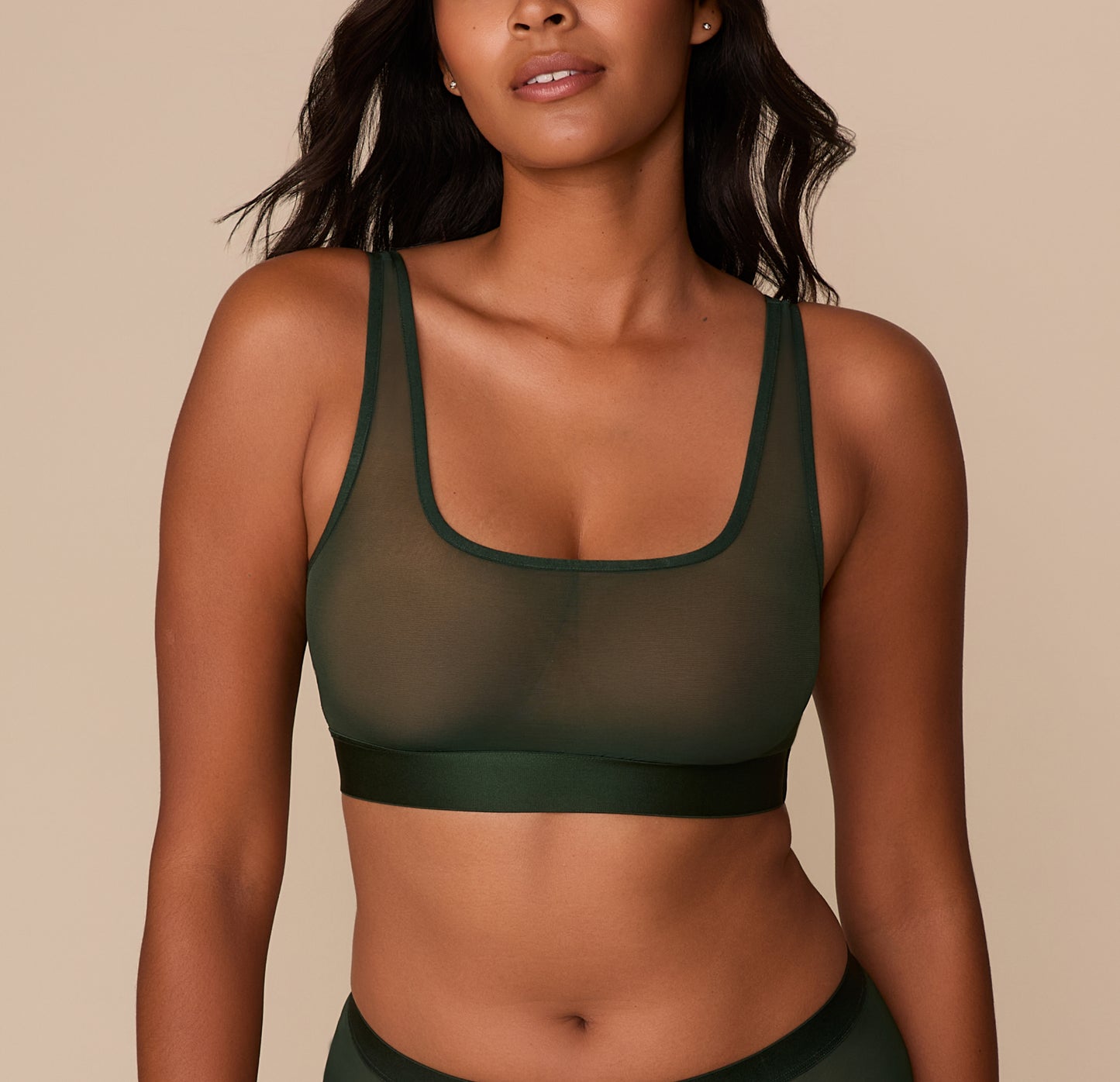 Front view of Victoria wearing the ComfortMesh™ Scoop Bralette in Sequoia. The sheer mesh fabric and wide scoop neckline offer lightweight comfort and minimal coverage. sizing: Victoria wears size Medium