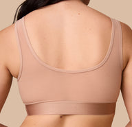 Close-up of the back of the ComfortMesh™ Scoop Bralette in Taupe. The lightweight material and wide band showcase a smooth and secure fit.
