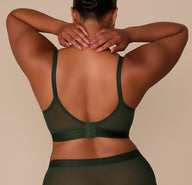 Back view of Zarria in the ComfortMesh™ Triangle Bralette in Sequoia, showing the deep scoop back and hook-and-eye closure for customizable comfort.