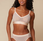 Close up of Ally wearing the ComfortMesh Triangle Bralette in Pearl. The front adjustable straps and triangle neckline are emphasized. sizing: Ally wears a size Small. 