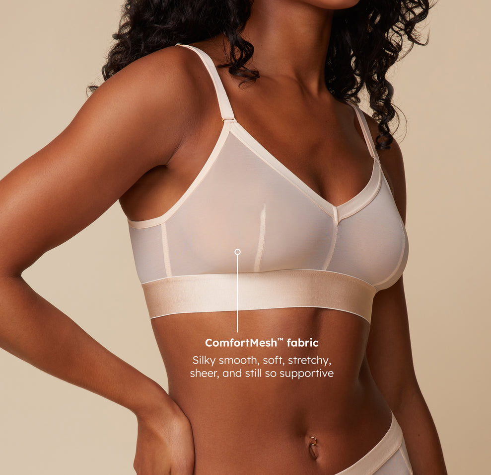 A close-up side view of Ally in the ComfortMesh™ Triangle Bralette in Pearl, showcasing the soft, stretchy ComfortMesh™ fabric with the tagline: "Silky smooth, soft, stretchy, sheer, and still so supportive."