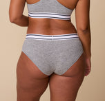 Back view of India in the Cloud Cotton Retro Hiphugger in Heather Charcoal. The hip-hugging cut offers coverage while maintaining a modern silhouette.