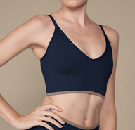 Close up of the Lounge Rib Triangle Bralette in the color True Blue.