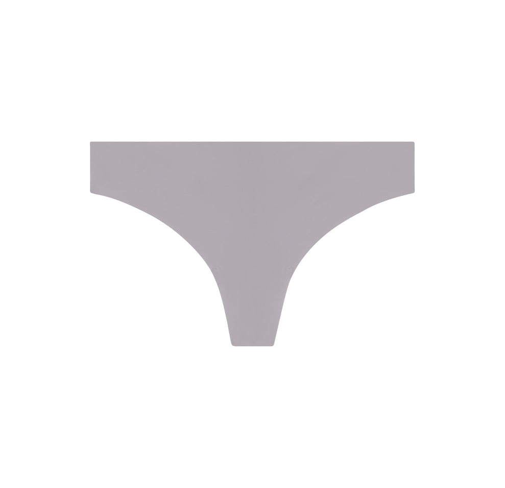 Opal-colored No-Show Thong laid flat, highlighting its seamless construction for invisible wear under clothing.