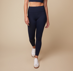 Megan wearing the Flex High Rise Legging in Ink. The legging molds comfortably to the body. sizing: Megan wears size Medium