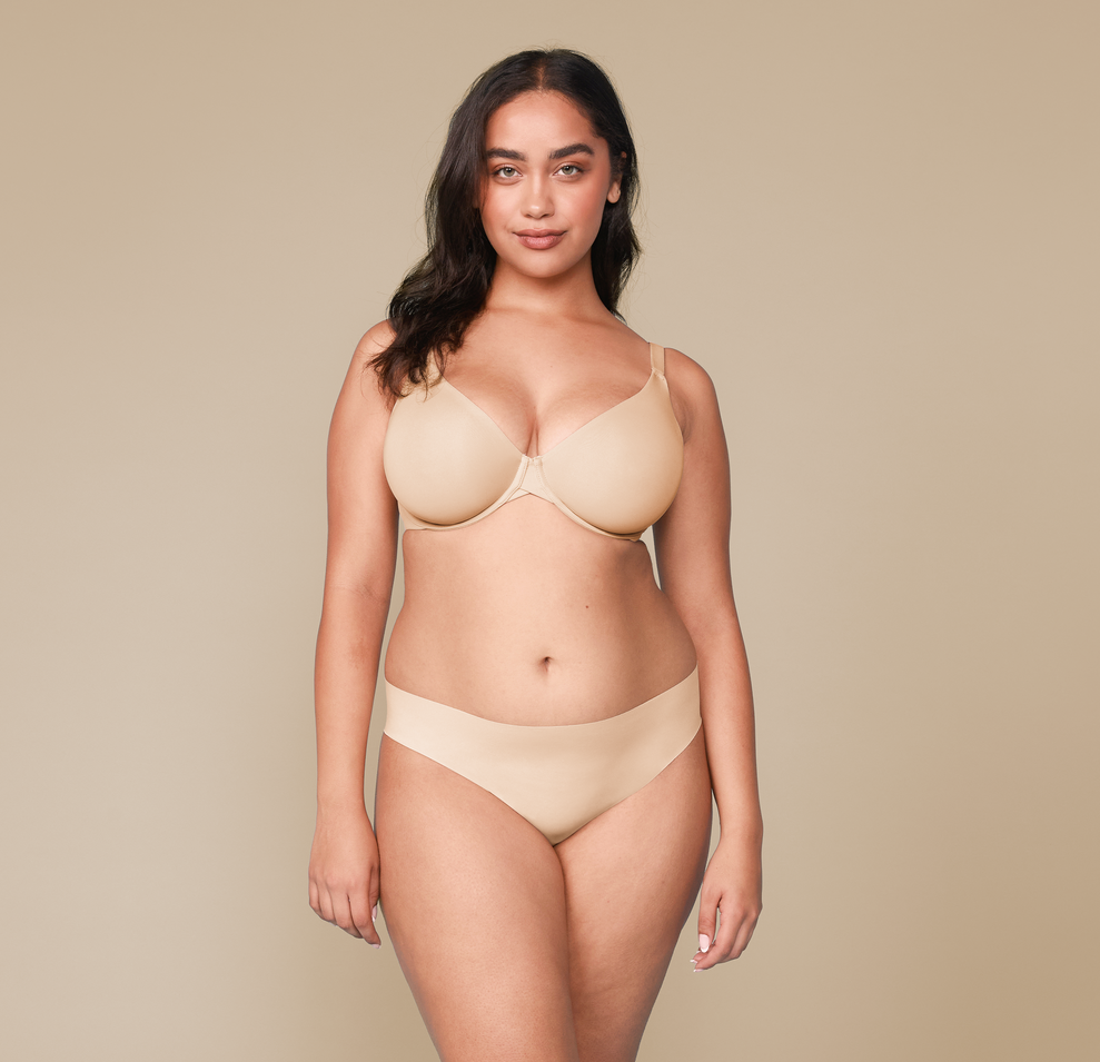 Woman wearing the No-Show Bikini in the color Beige