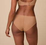 Ally is shown from behind, highlighting the full-coverage back and raw-cut edges for a sleek, no-show finish.