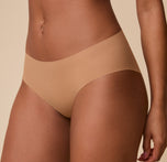 A detailed close-up of the No-Show Hiphugger in Tan, showcasing the ultra-smooth fabric and lightweight, flexible feel.
