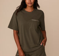 Front view of model Victoria wearing the Perfect Pima Pajama Tee and Shorts in Olive. The short-sleeve tee features a relaxed fit and a chest pocket trimmed with white piping. sizing: Victoria wears size Medium