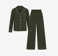 Harper Wilde Pima Pajama Set in Olive. Includes long sleeve, button-up top with white piping and matching long pajama pants. Set laid flat on a white background.