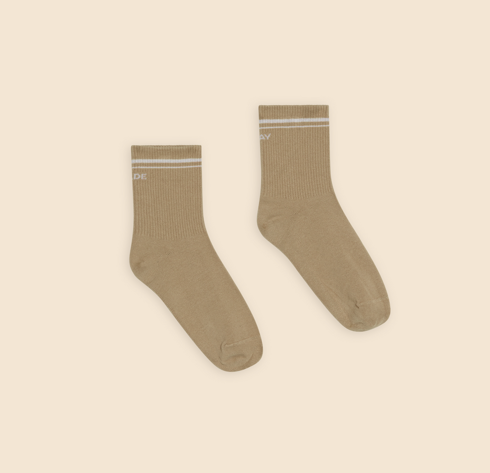 Flat lay of the Quarter Crew Socks in the color Tarragon.